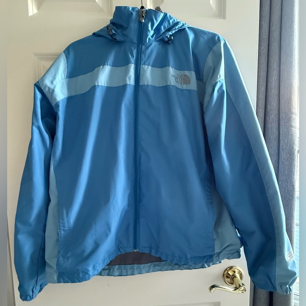 The North Face woman’s Two-Tone Blue Hooded Rain Jacket